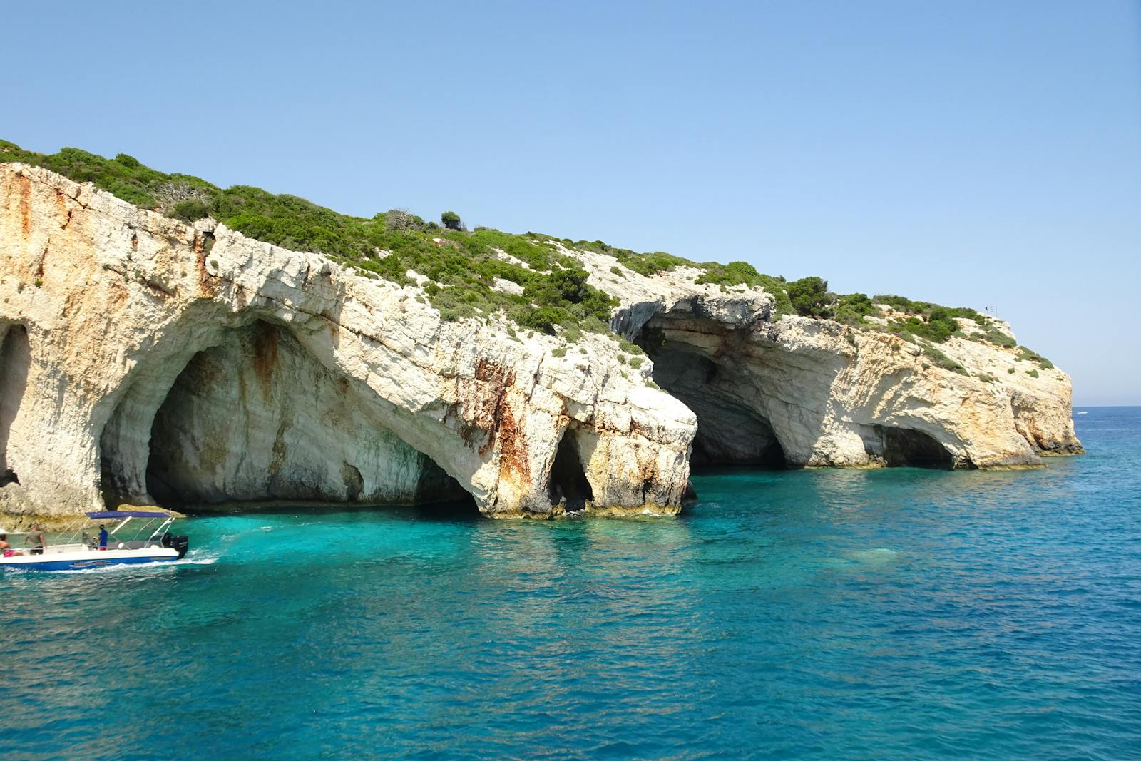 Explore the breathtaking Blue Caves formations on Zakynthos Island, Greece.
